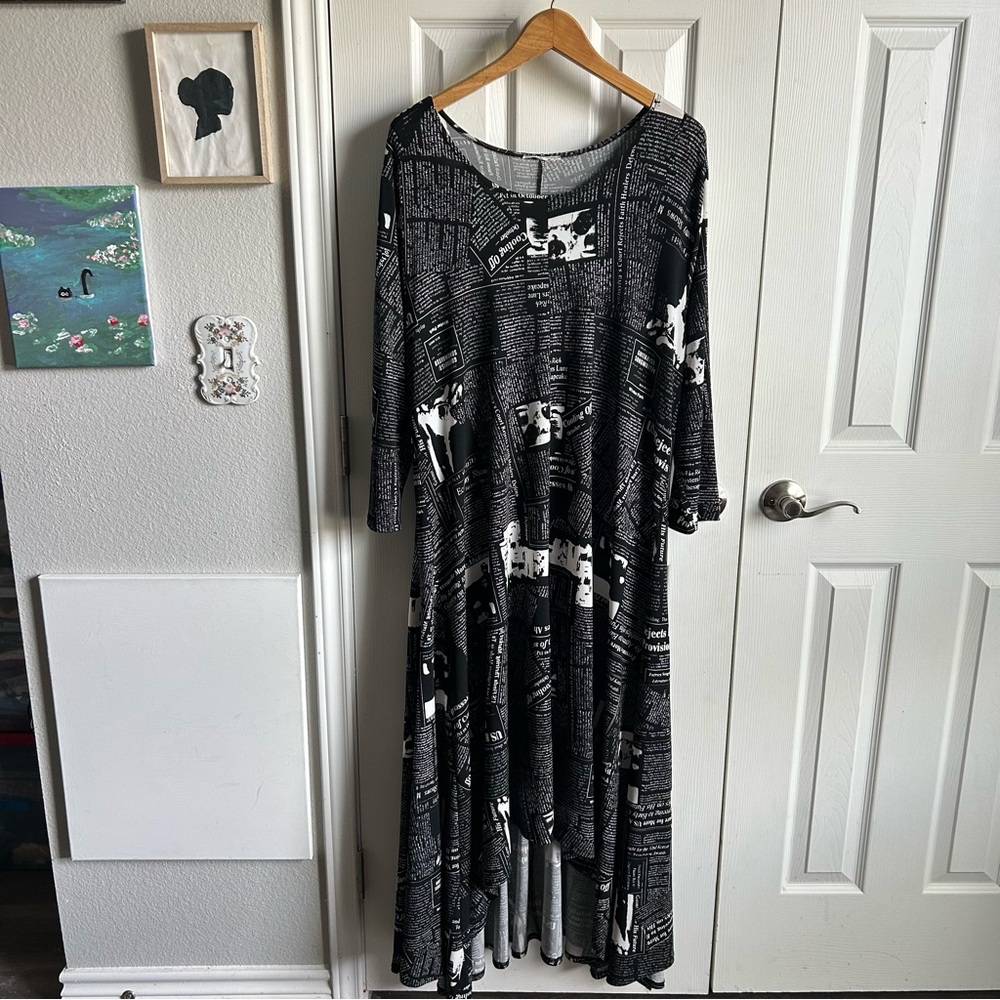 Long sleeve asymmetrical newsprint maxi dress